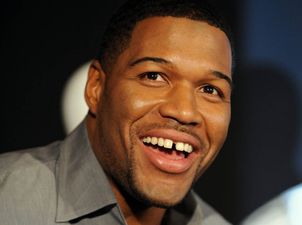 Top 20 de celebridades con mala dentadura Michael Strahan